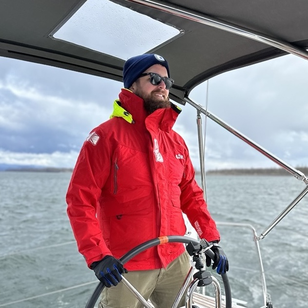 Photo of Greg sailing